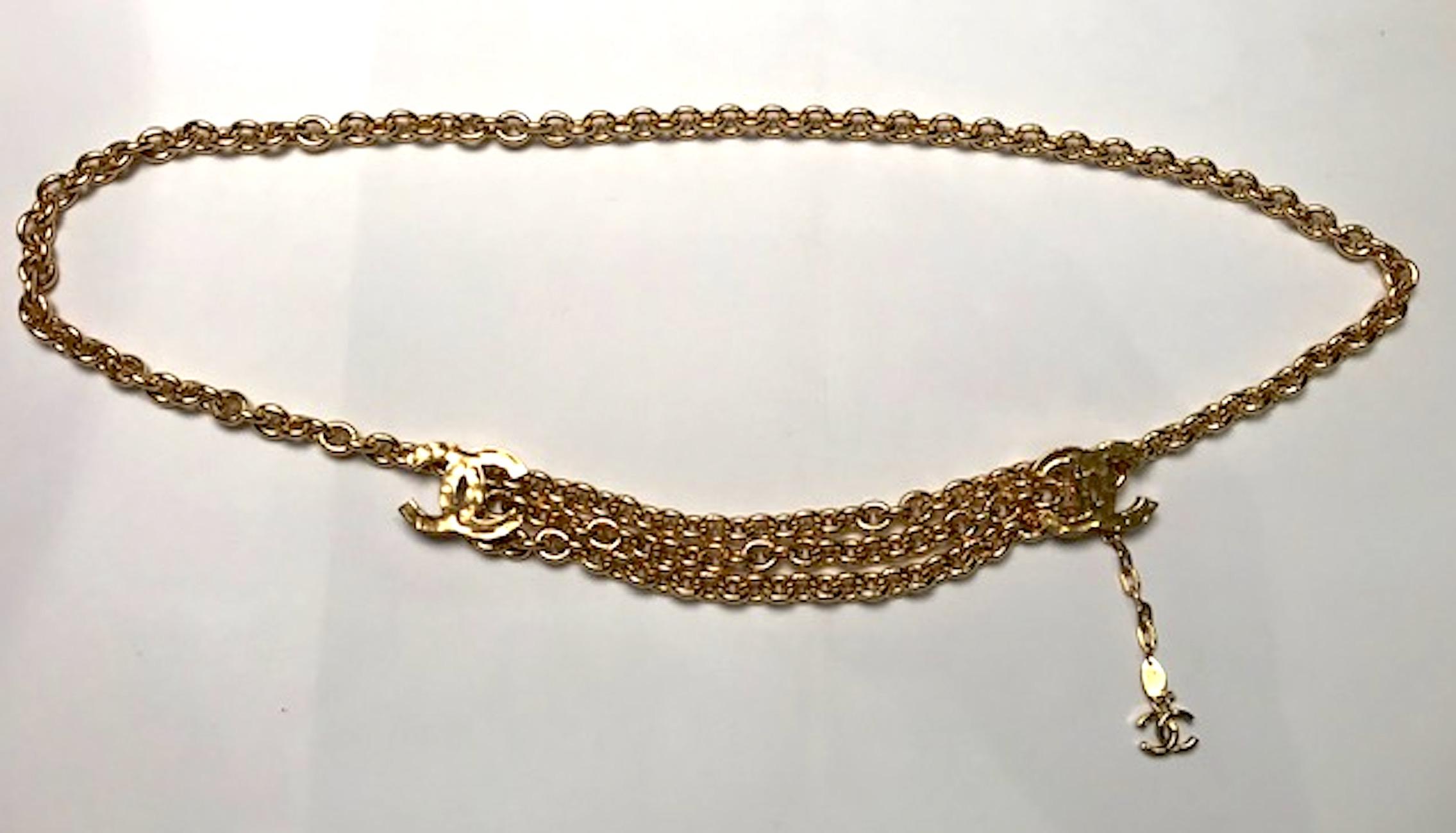 Classic Chanel gold chain belt from 1985. Center swags with two large Chanel CC logos. The total length of the belt is 33 inches. Three chains comprise the 7
