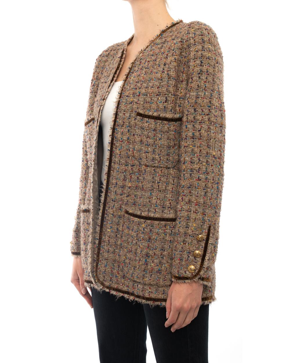Chanel 1986 Vintage Brown Tweed Jacket with Gold CC Buttons.  From the fall 1986 collection. Brown velvet ribbon trim, front chest and hip pockets, goldtone CC logo buttons, raglan sleeves, worn open with no closures.  Taupe brown tweed with flecks