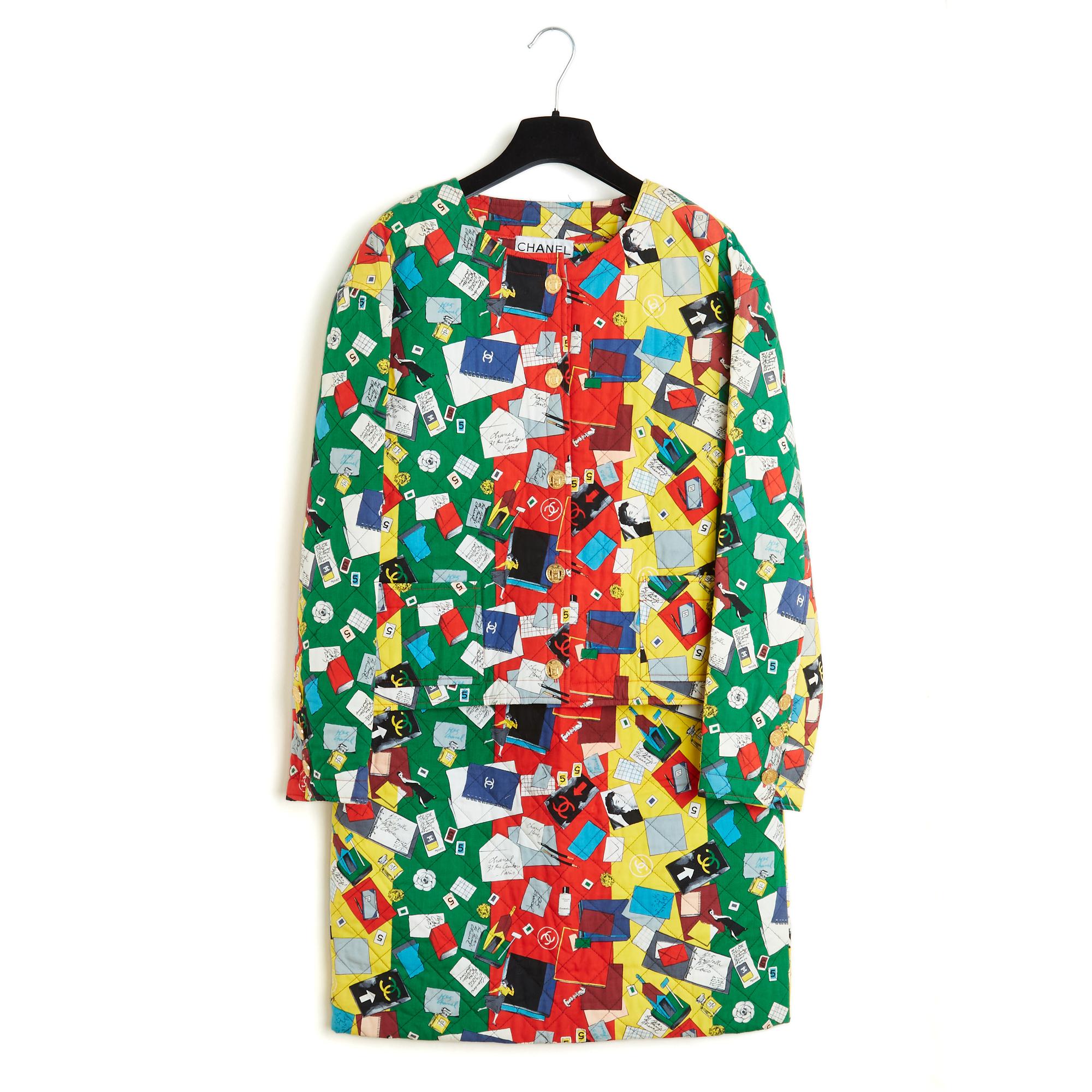 Chanel jacket SS1987 collection by Karl Lagerfeld skirt suit in quilted cotton canvas with CC and Chanel logo and symbol pattern, camellia, rue Cambon 5 ... on a background of wide red, green, yellow stripes, ... The jacket, oversized volume, round