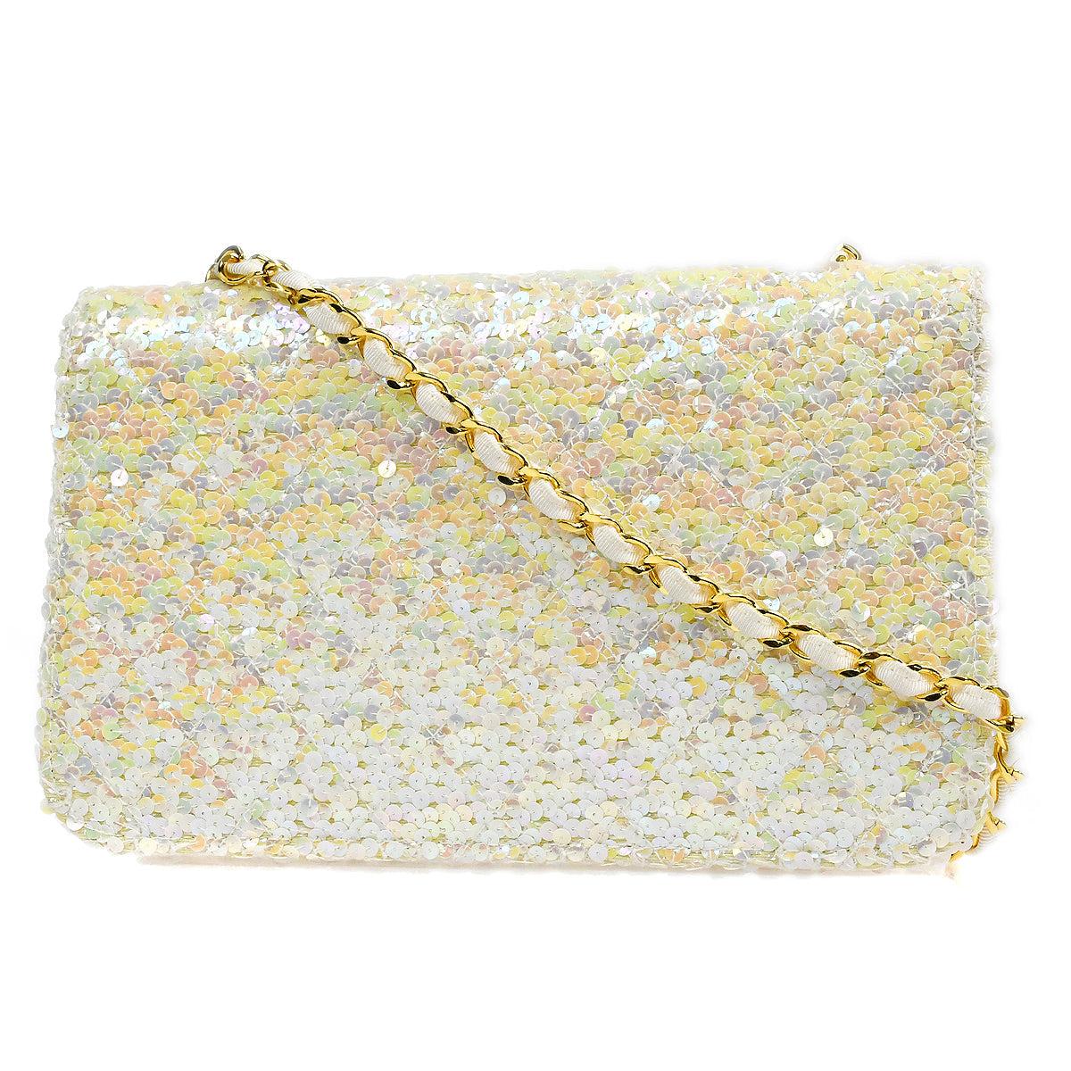 Chanel Flap Chain Shoulder Bag White Sequin

Additional information:
Material : Sequin, Canvas
Color: White, Pink, etc
Pocket : Inside: Zipper Pocket x1, Pcoketx1
Comes with : Serial Sticker, Authenticity Card, Dust Bag, Box
Size(Inch) : W 9.8 x H