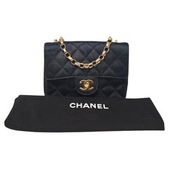 Chanel 1990 Black Quilted Satin Bijoux Mini Flap Bag