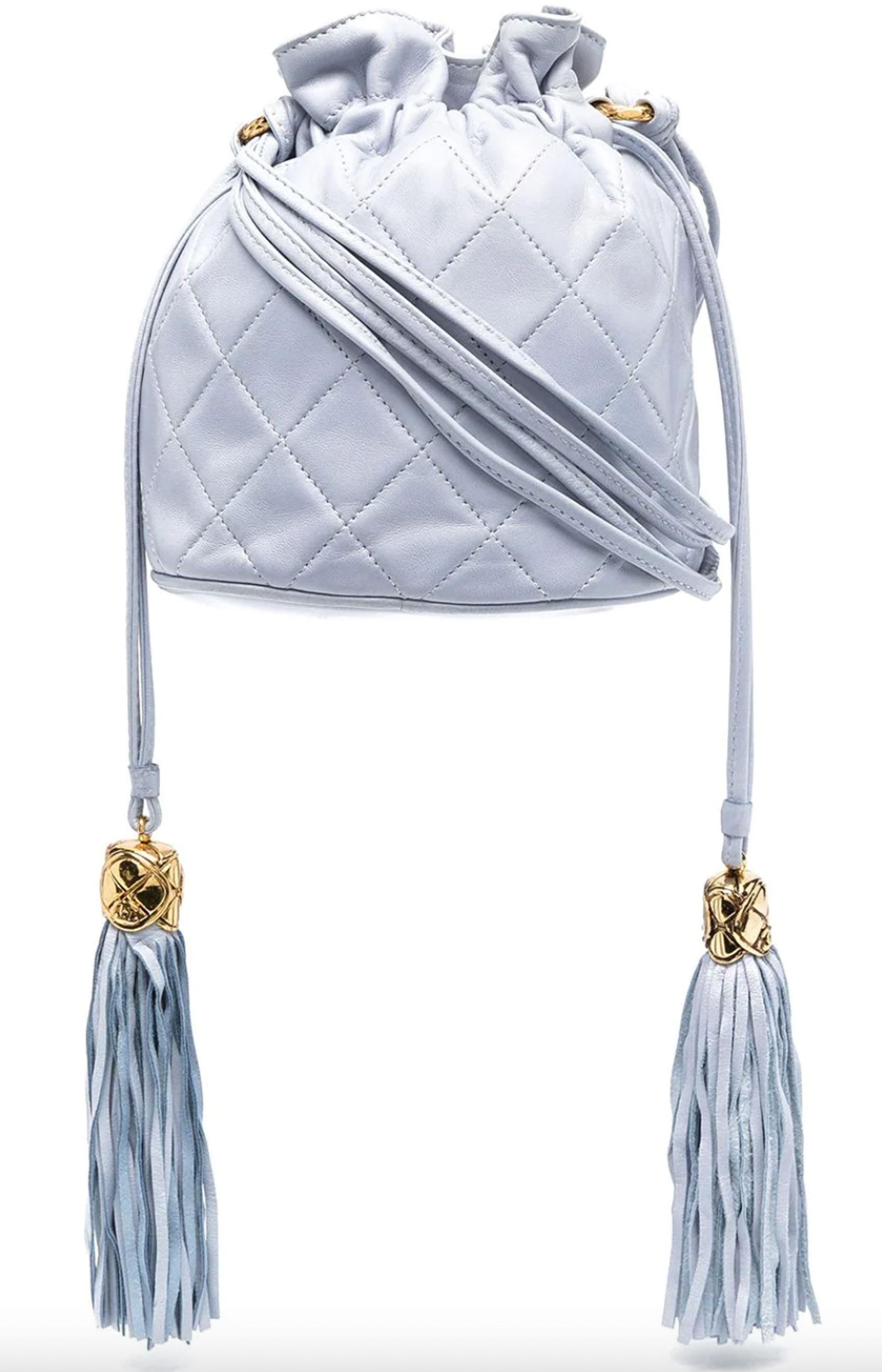 Chanel Drawstring Bucket Quilted Two Tone Light Blue Lambskin Leather Hobo Bag

1990 {Vintage 34 Years}

Gold plated hardware
CC stitched at bottom of bag
Lambskin quilted leather
Drawstring fastening
Draped tassel detailing

Made in Italy


5.51