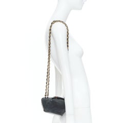 CHANEL 1990 Foldover Diamond Quilted dark grey lambskin mini bucket bag