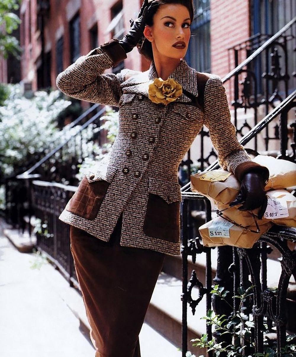 Extremely rare, collectible Chanel beige tweed jacket with quilted suede details from in dapper 'Old English' style -- from 1990 Ready-To-Rear Collection, as seen in Ad Campaign and on Catwalk on Supermodel Yasmeen Ghauri!
- CC logo suede buttons