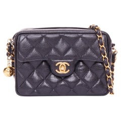 CHANEL 1990 Vintage black caviar quilted leather CC turnlock mini camera bag