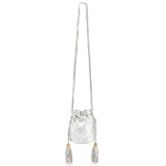 Chanel 1990 Vintage Metallic Silver Quilted Mini Lambskin Drawstring Tassel Bag