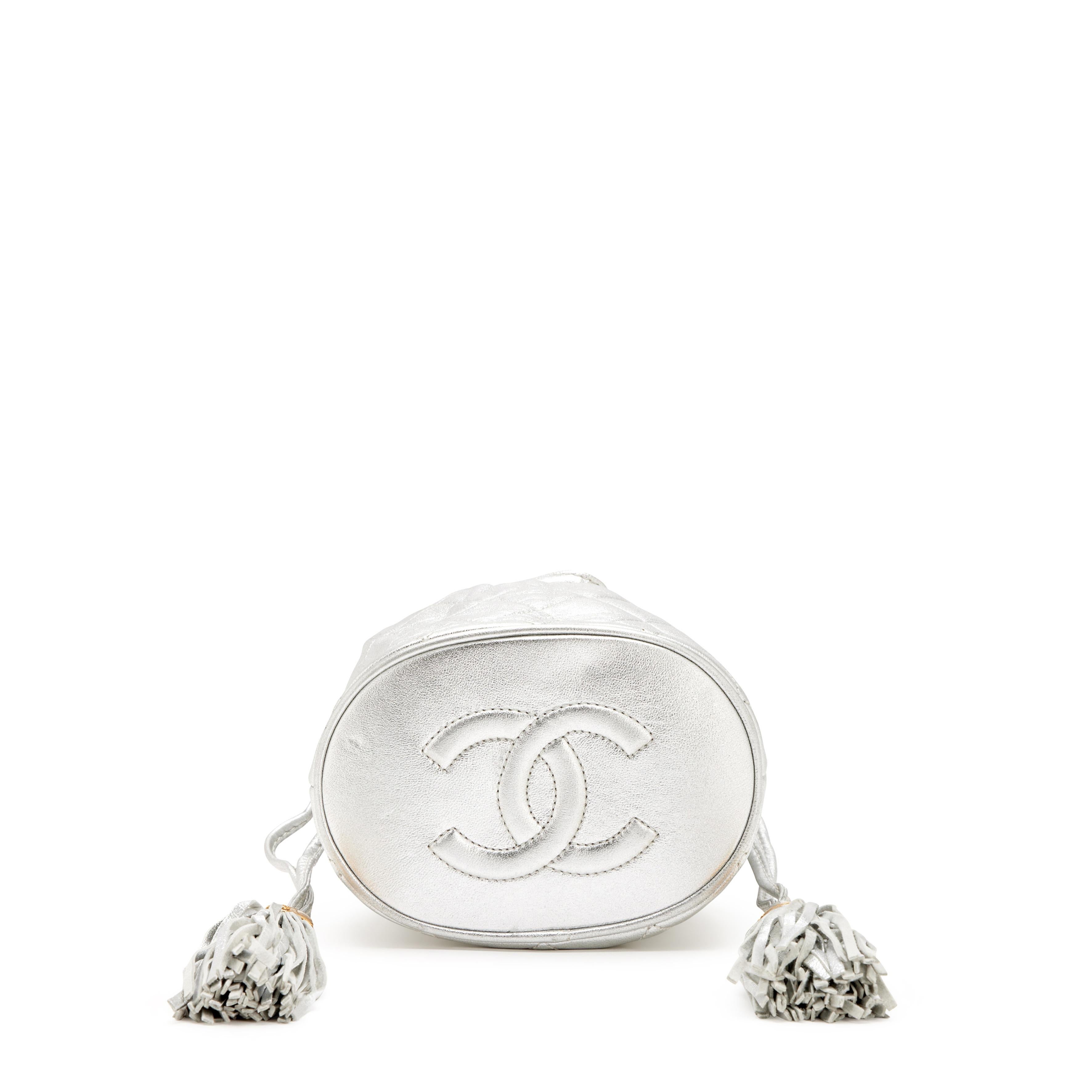 Chanel 1990 Vintage Metallic Silver Quilted Mini Lambskin Drawstring Tassel Bag For Sale 2