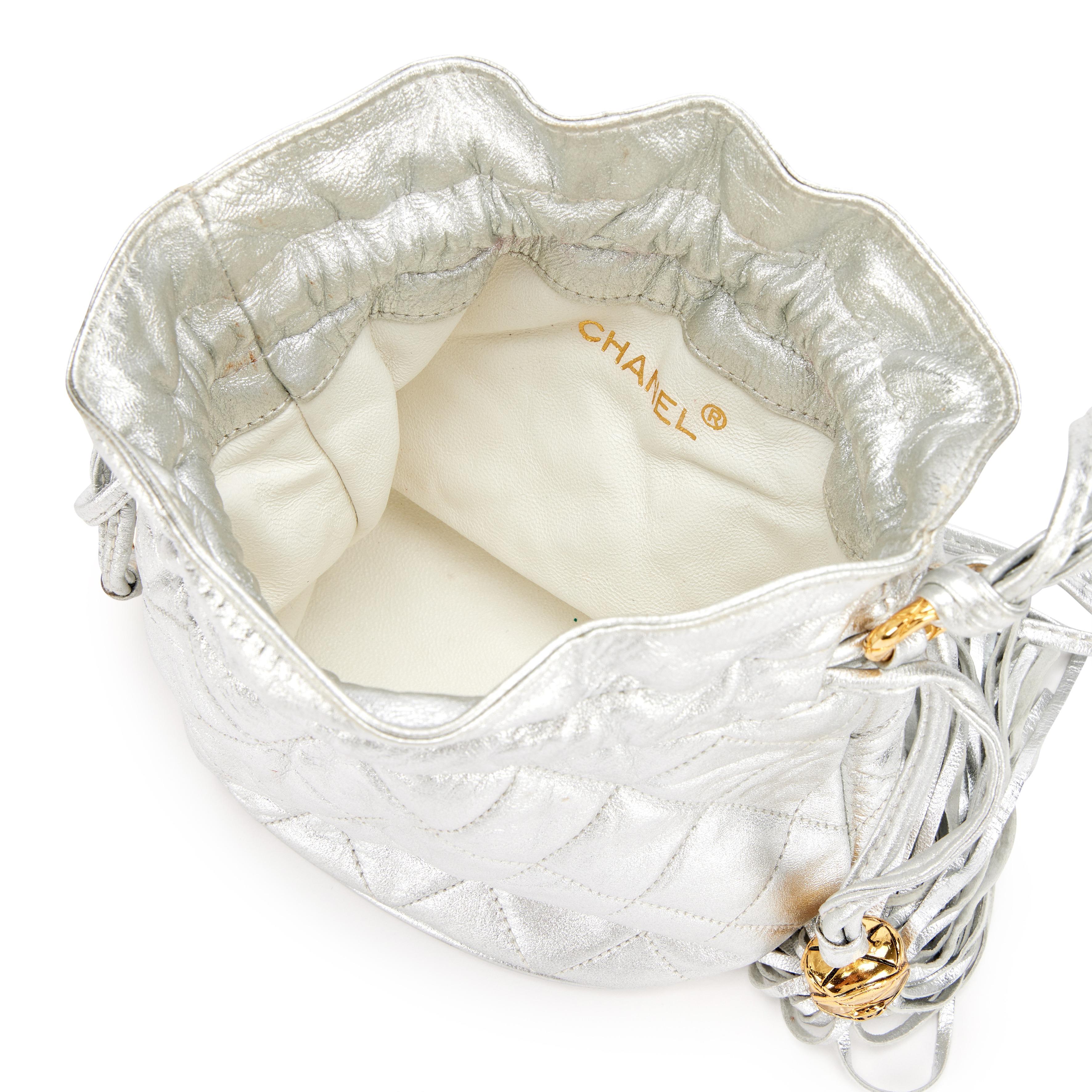 Chanel 1990 Vintage Metallic Silver Quilted Mini Lambskin Drawstring Tassel Bag For Sale 3