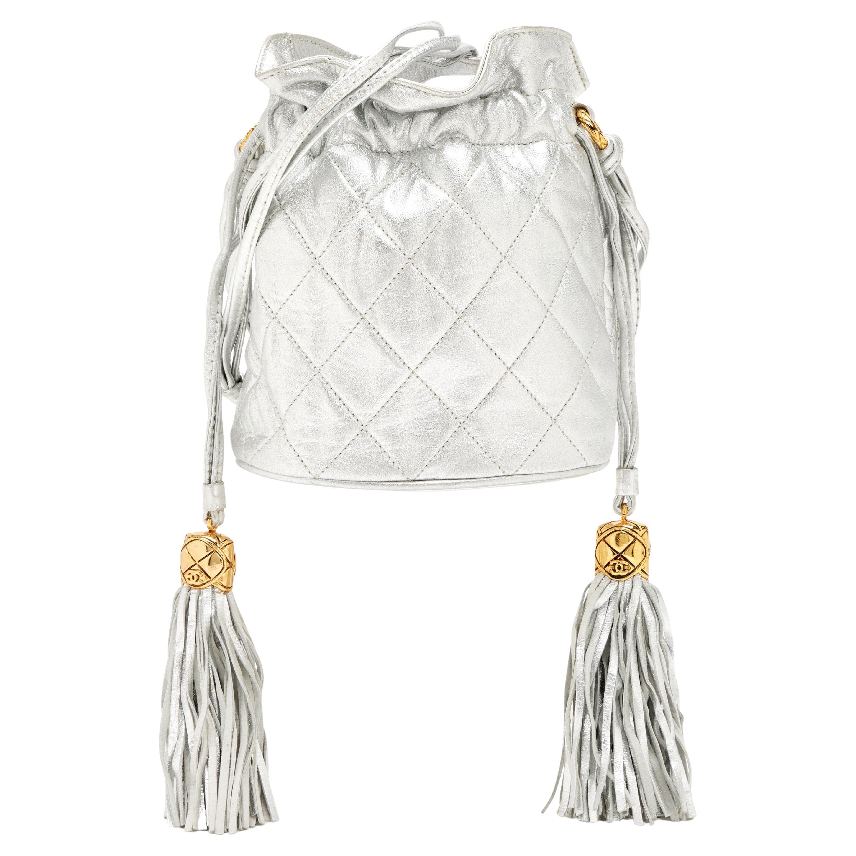 Chanel 1990 Vintage Metallic Silver Quilted Mini Lambskin Drawstring Tassel Bag