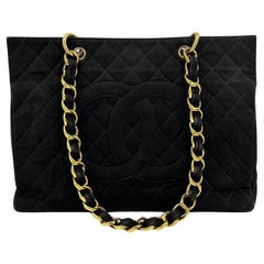 Chanel 1990s Black Canvas Grand Shopper Tote with Gold Hardware