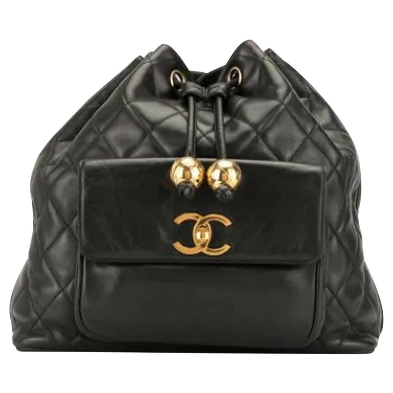 chanel quilted drawstring bag