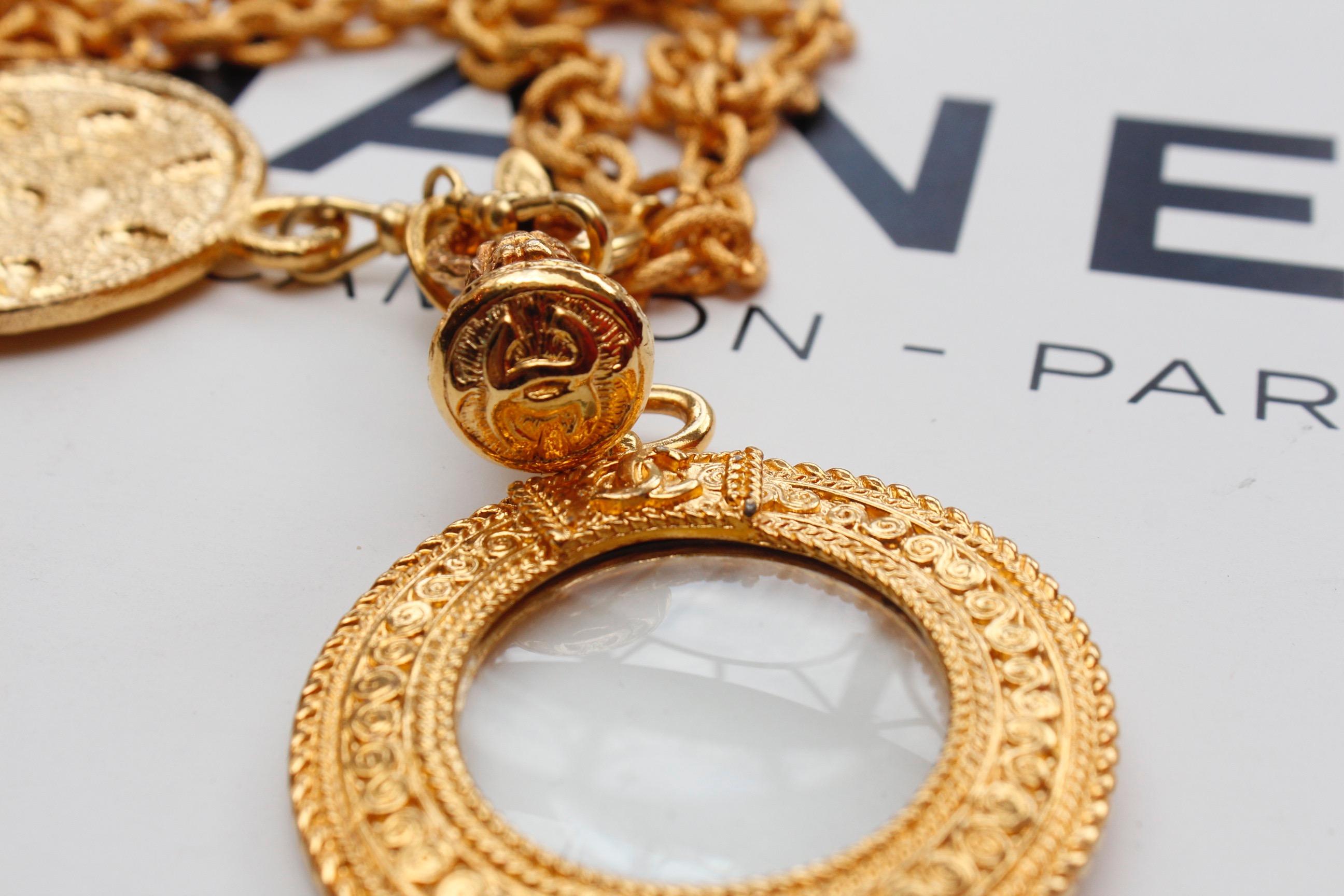 CHANEL 1990s Gilted metal chain necklace with magnifying glass and coin pendant For Sale 2