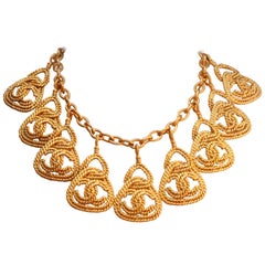 CHANEL 1990s Gilted metal necklace with openworked CC pendants