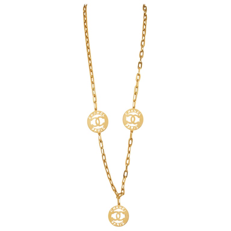 Chanel 1990s Gold Link Necklace With Signature Medallion Charms at 1stDibs
