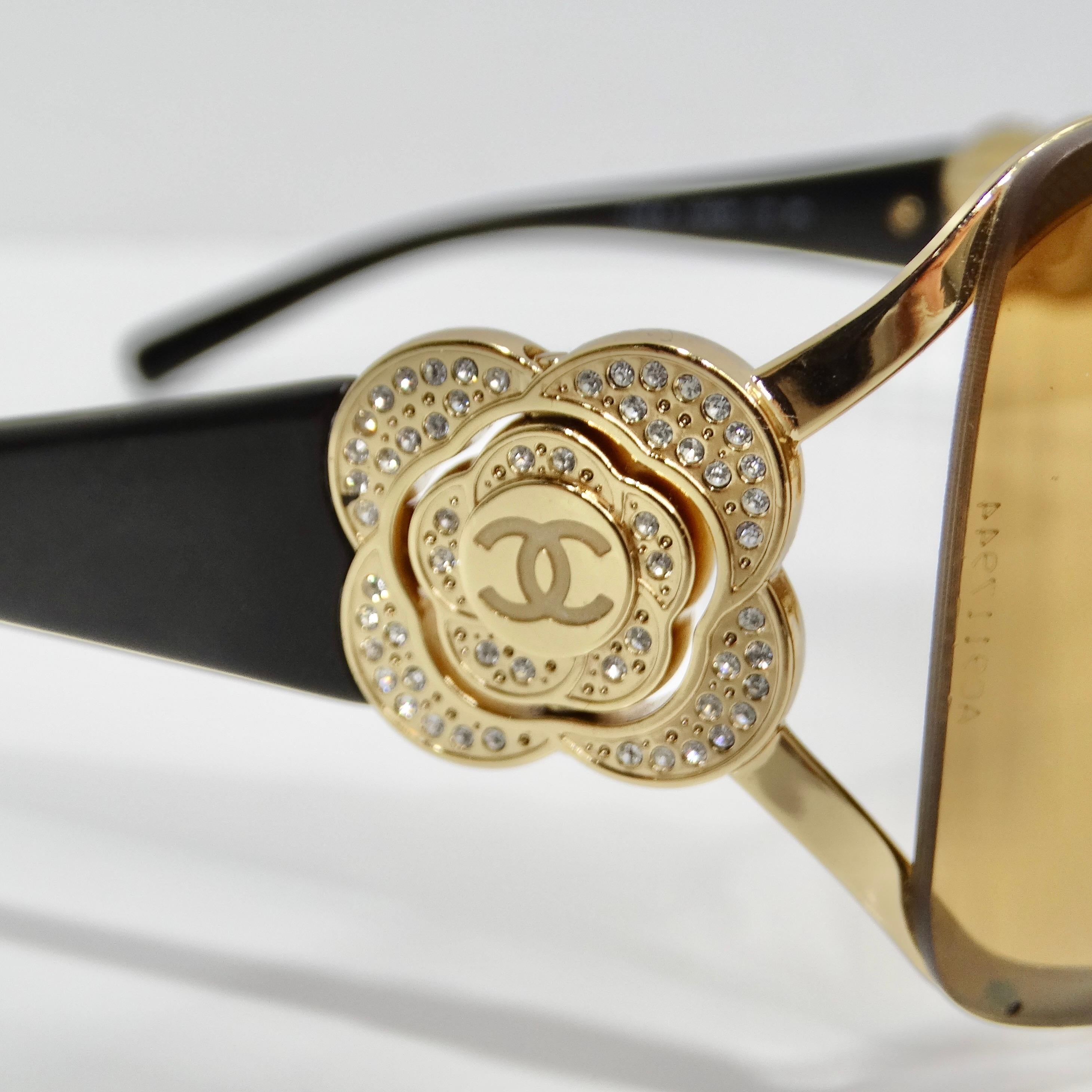 Women's or Men's Chanel 1990s Gold Tone Camelia Shield Sunglasses For Sale