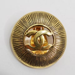 Chanel 1990s Gold Tone CC Starburst Earrings
