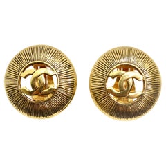 Chanel 1990s Gold Tone CC Starburst Earrings