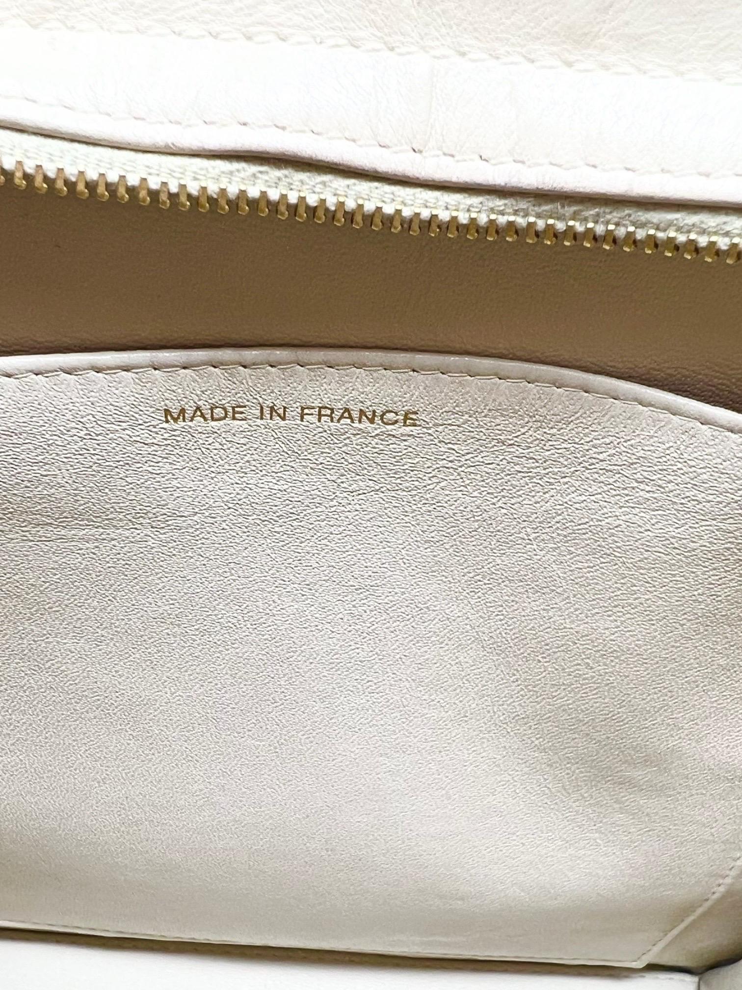 Chanel 1990s Ivory Lambskin Shoulder Bag with Tonal Embroidered Logo In Good Condition For Sale In Kingston, NY