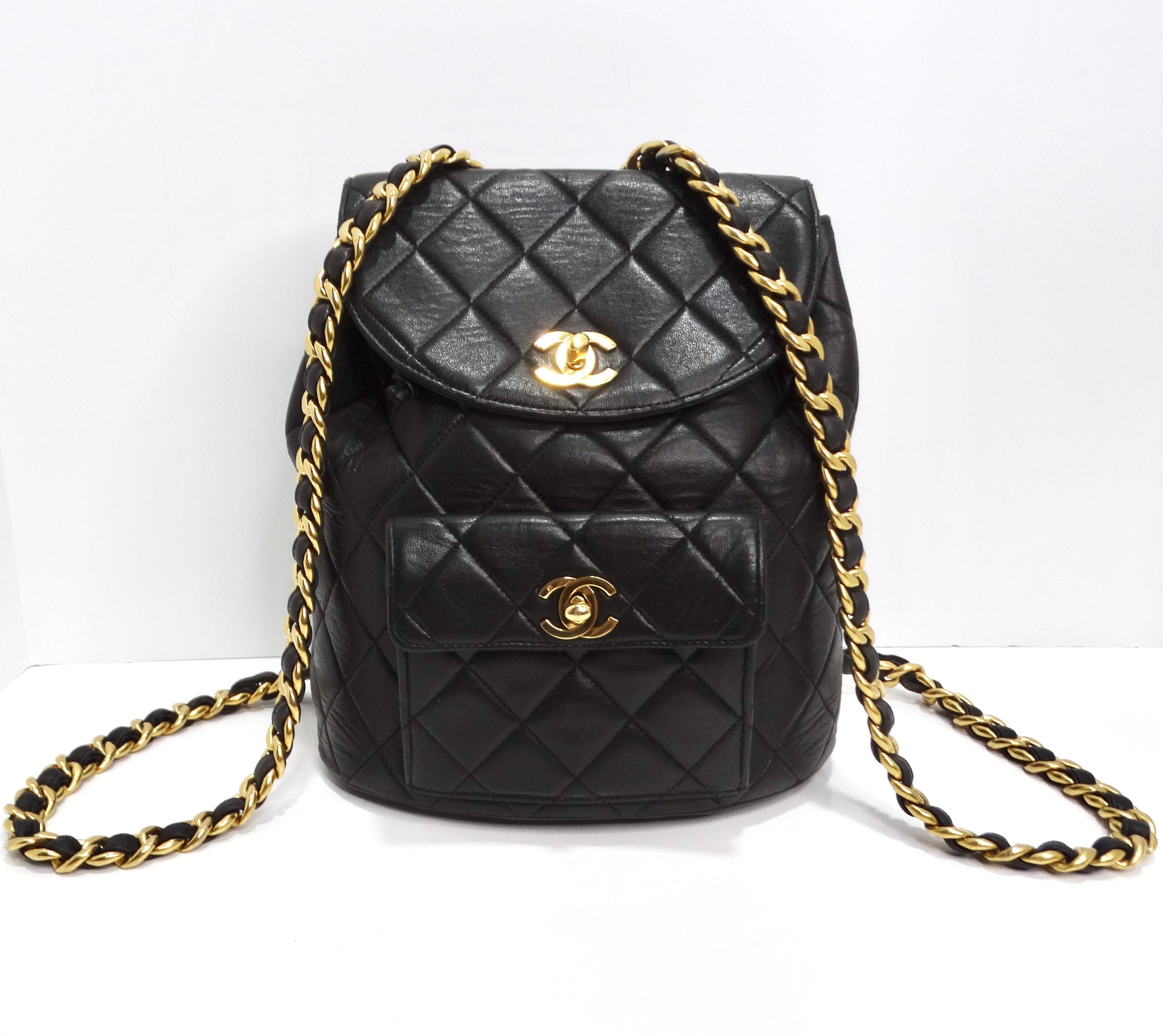 Introducing the iconic Chanel 1990s Lambskin Quilted Backpack, a timeless piece that exudes sophistication and luxury. Crafted from black lambskin leather, this mini backpack features Chanel's signature quilting, adding texture and elegance to the