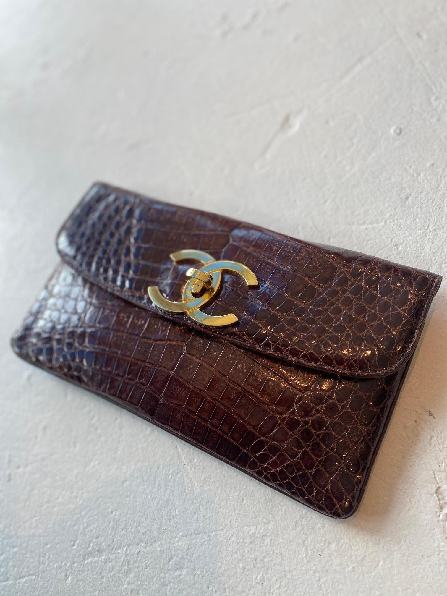 Gorgeous 24k large gold plated cc turn-lock closure 
Original tags from 1990's Barneys are still attached
Collectors Item RARE
interior brown lambskin lining that shows about 3 faint hairline scratches
some minor natural occurring fading to