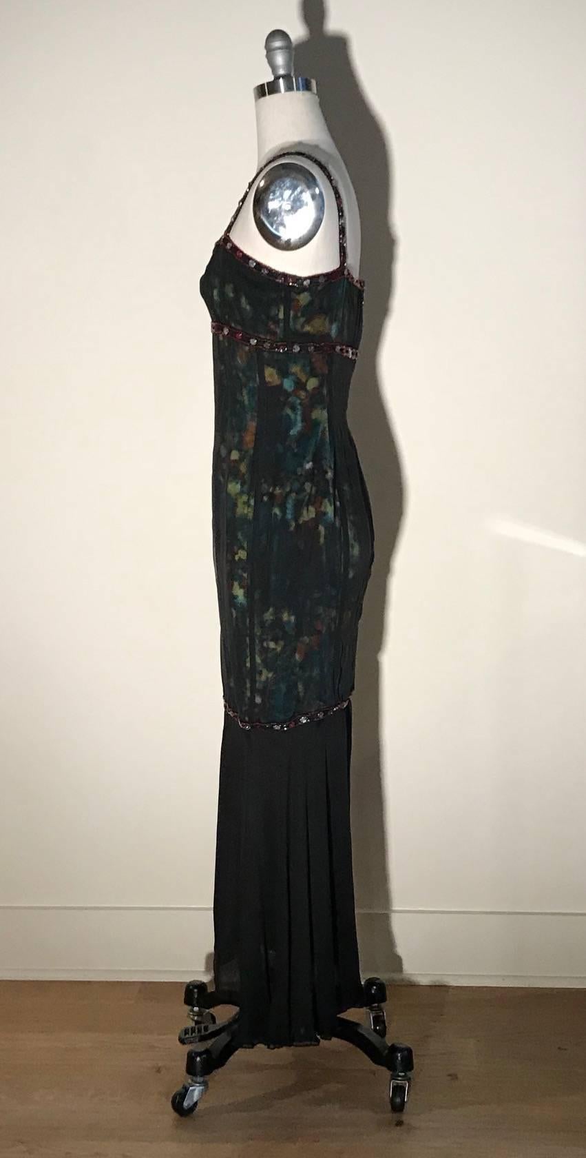 Chanel Boutique evening dress from the Fall 1997 collection, as seen on the runway. Multicolored velvet is covered with a black silk chiffon that extends to mid calf. Red, lavender and black beaded embellished trim. Abstract CC logo printed on