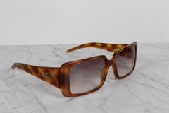 CHANEL 1990s Square Frame with Amber Tortoise Quilted Arms "CC" Sunglasses