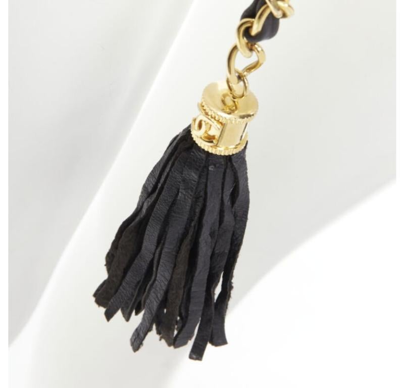 CHANEL 1990's Vintage gold chain leather interwoven link tassel charm belt
Reference: BMPA/A00218
Brand: Chanel
Designer: Karl Lagerfeld
Collection: 1990s
Material: Metal, Leather
Color: Gold, Black
Pattern: Solid
Closure: Hook & Eye
Extra Details: