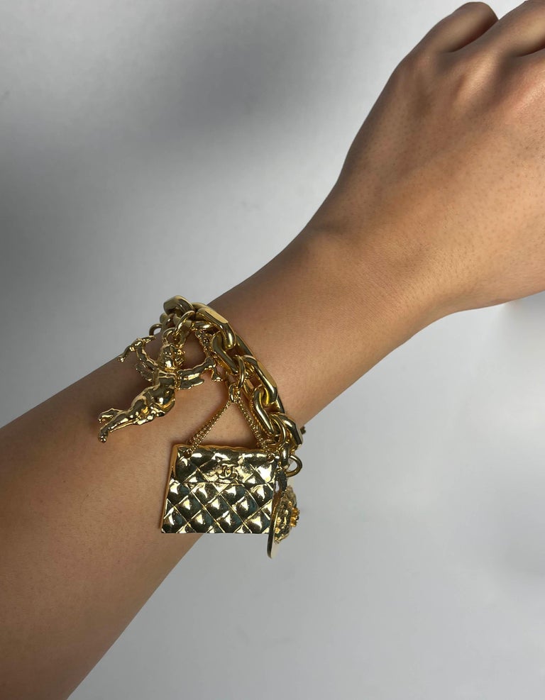 Chanel 1990s Vintage Goldtone Classic Icons Charm Bracelet For Sale At 1stdibs