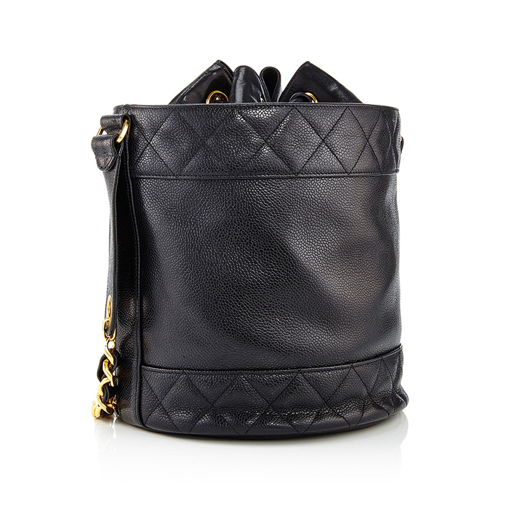 Women's or Men's Chanel 1991 Black Caviar Leather Vintage Drawstring Drum Shaped Shoulder Bag For Sale