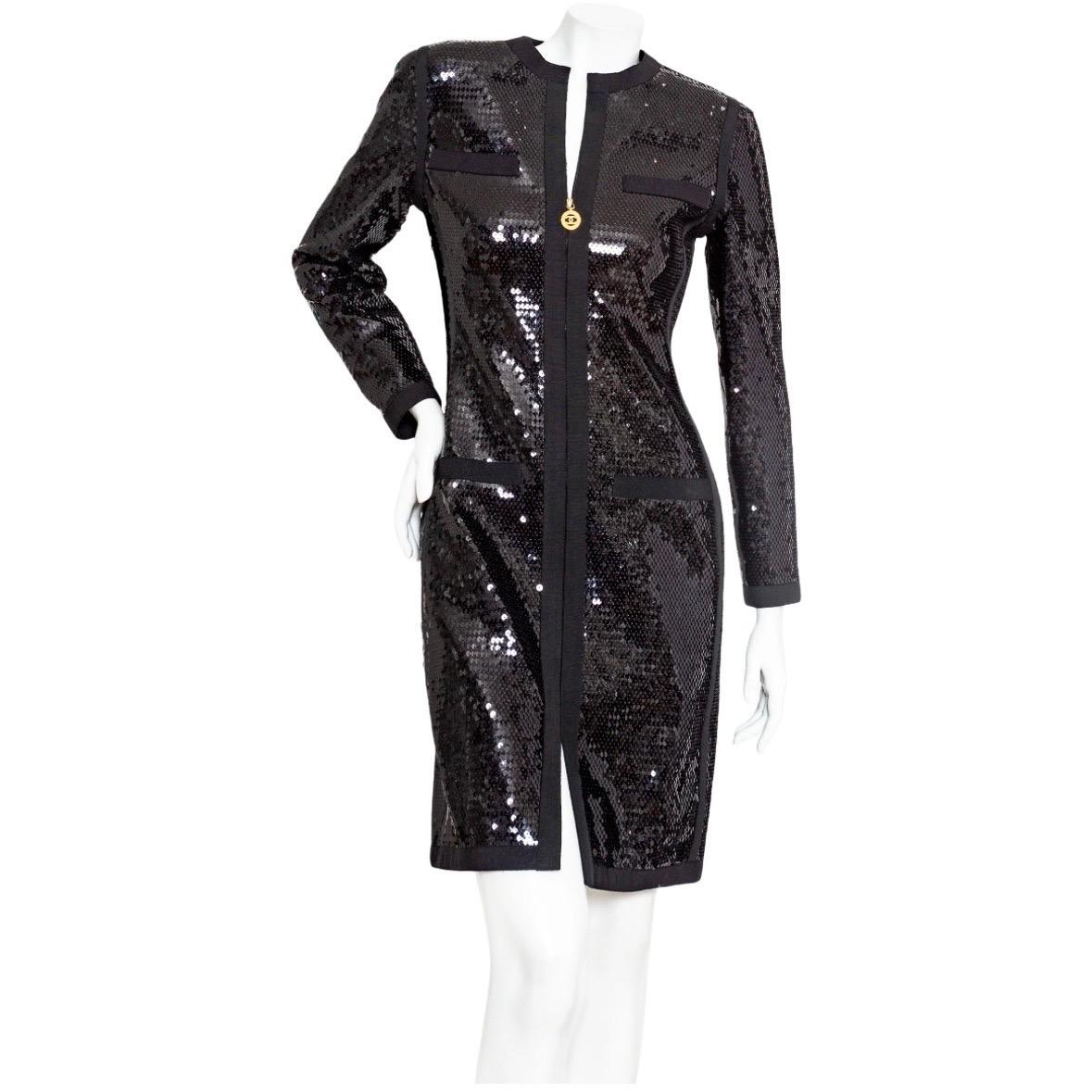 Chanel 1991 Black Sequin Scuba Dress

Spring/Summer 1991 Collection by Karl Lagerfeld
Black
Long sleeve
Round neckline
Front zipper closure with gold-tone CC pull
Twill ribbon trim
Mini length
Sequin; silk lining
Made in France
Great pre-owned