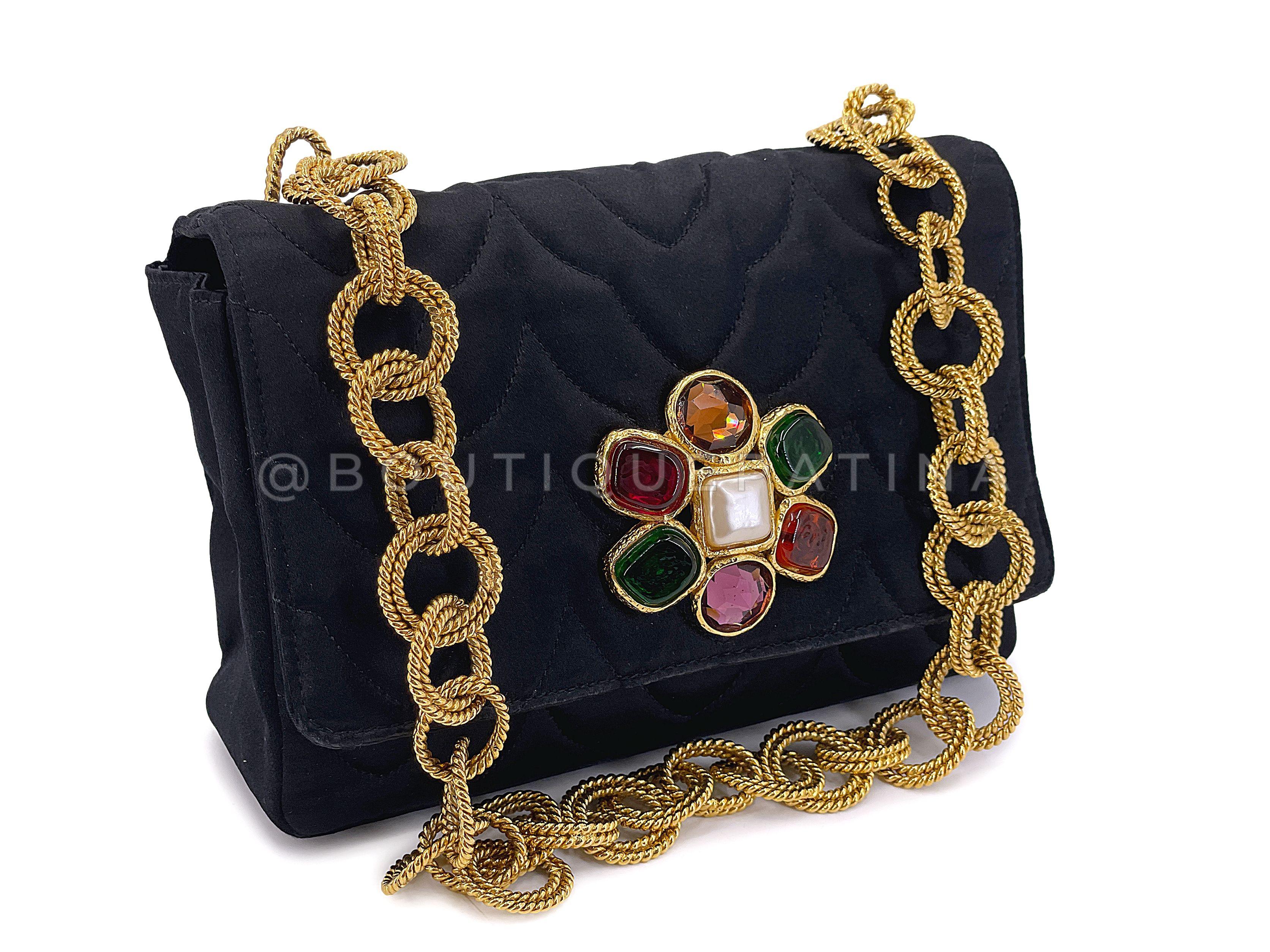 Store item: 67830
Chanel 1991 Vintage Black Quilted Satin Jeweled Gripoix Flap Bag GHW is a collectible, rare item especially in excellent condition as found here.

For 20 years, Boutique Patina has specialized in sourcing and curating the most