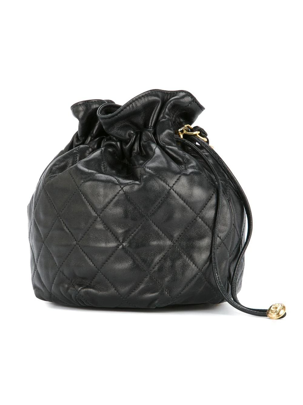 Chanel 1991 Vintage Drawstring Black Lambskin Mini Bucket Crossbody Shoulder Bag In Good Condition For Sale In Miami, FL