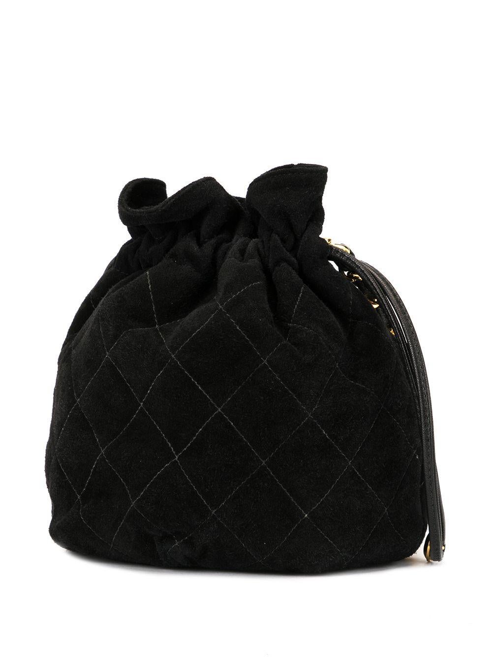 Women's or Men's Chanel 1991 Vintage Drawstring Suede Mini Bucket Crossbody Shoulder Bag For Sale