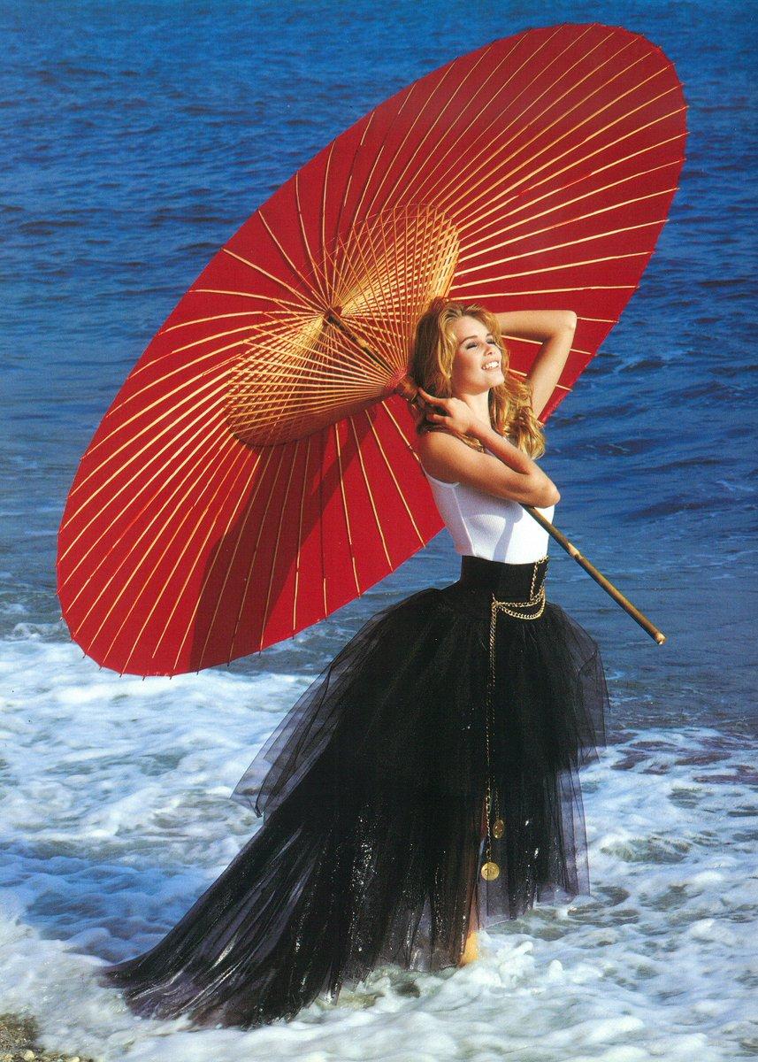 Chanel 1991 Wide Long Chain Medallion Red Leather Belt.

Vintage statment belt as seen on Claudia Schiffer from the Spring/ Summer 1991 Chanel Campaign (Collection 28). Features a wide red leather belt with iconic Chanel buckle with 2 tiered super