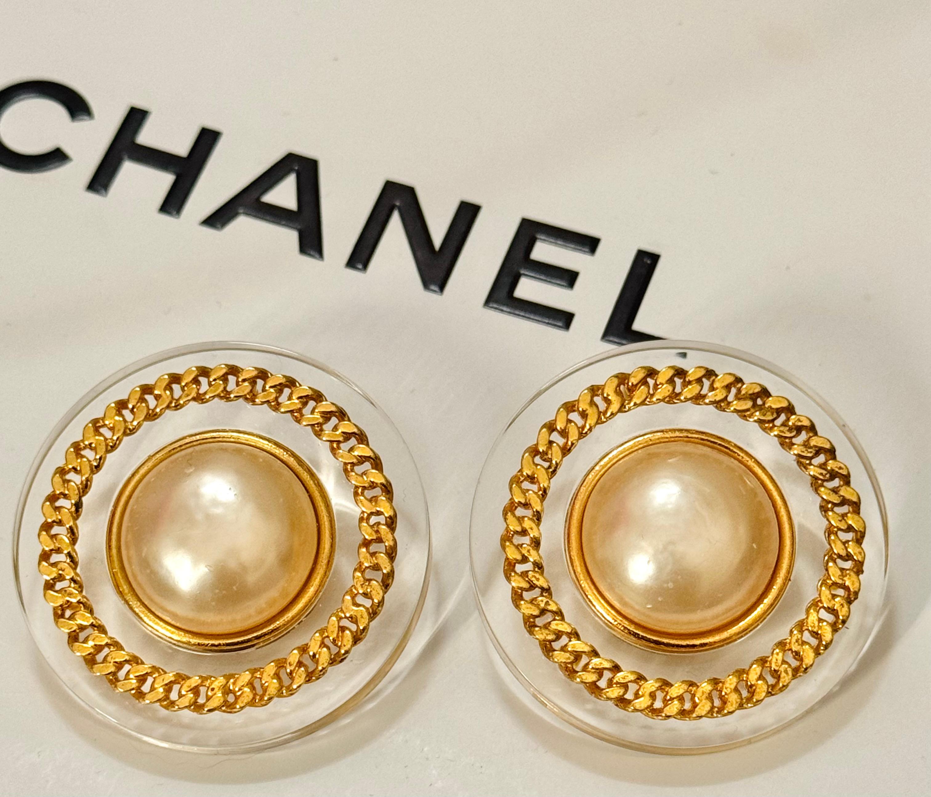 Chanel 1992 (Season 28 by Victoire de Castellane) large Gripoix glass pearl and lucite 24k gold plated clip on earrings, 1.6 x 1.6 inches, very good condition 