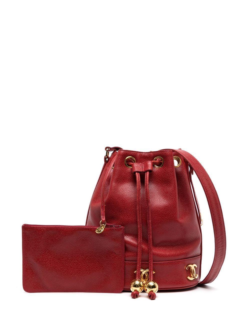 Women's Chanel 1992 Red Caviar Plaque Bucket Drawstring Tote Crossbody Bag For Sale