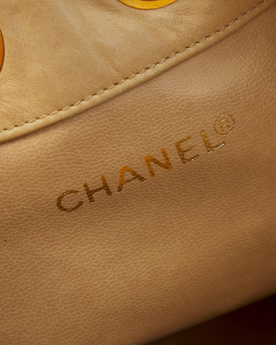 Chanel 1992 Vintage Raffia Straw Jute Gold CC Balls Drawstring Bucket Bag For Sale 5
