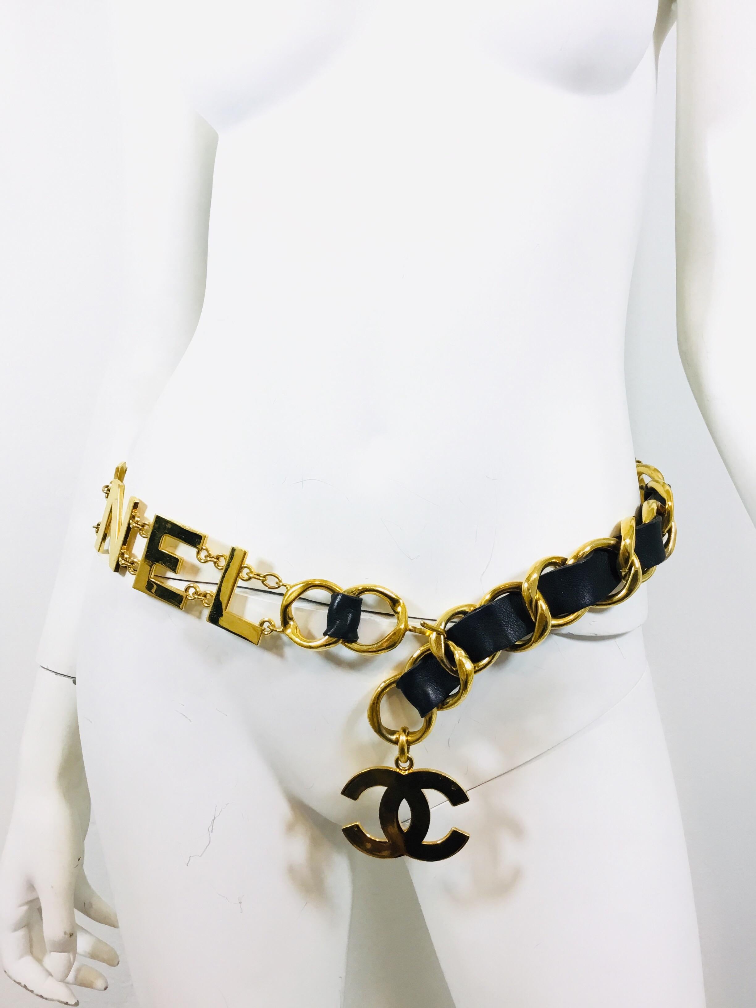 Vintage Chanel belt from 1993 featured in gold with black leather intertwined. Belt spells out “COCO CHANEL” and is approximately 36 inches long and close to 2 inches wide. Belt is in excellent vintage condition with some normal light scratches to