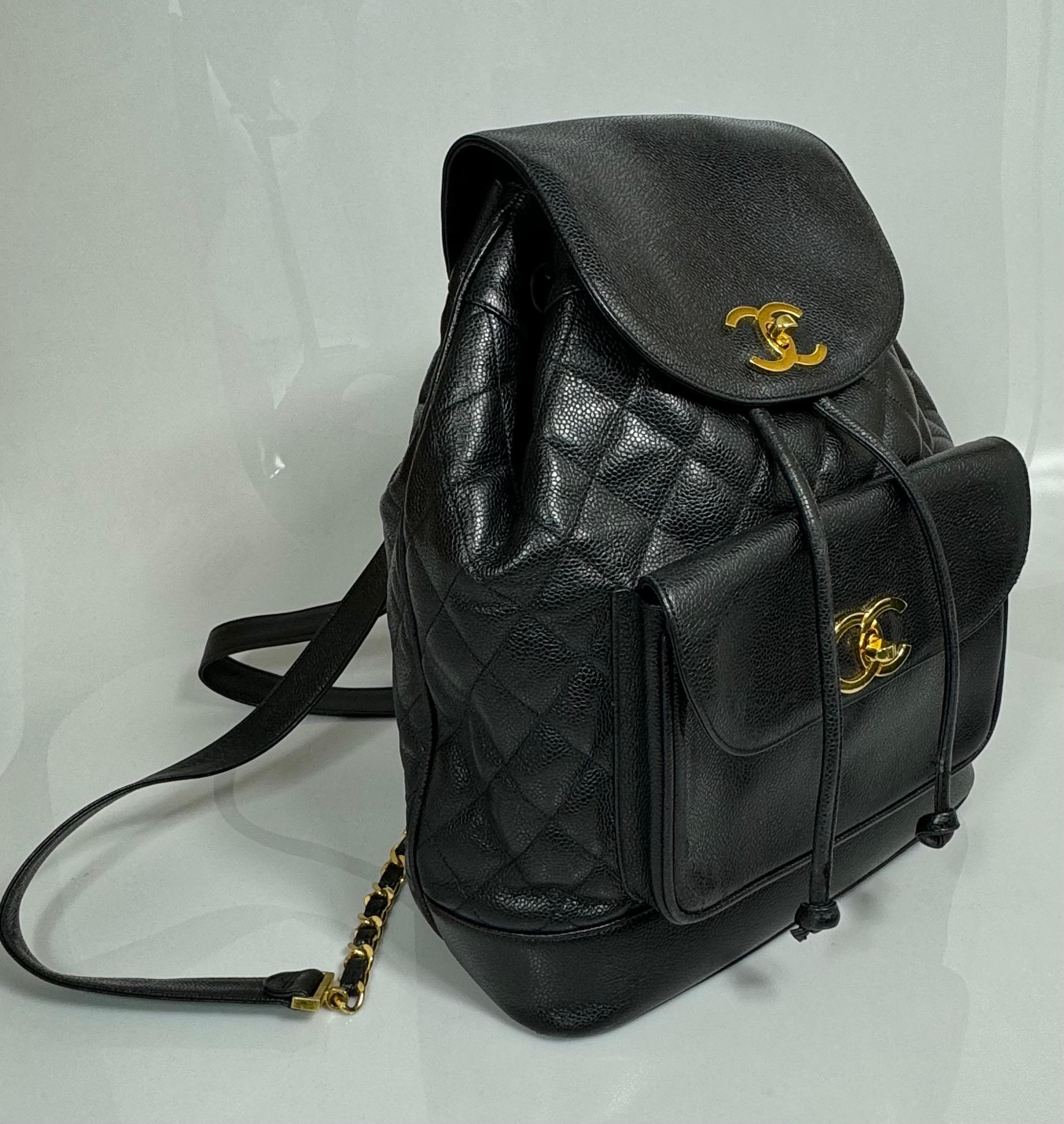 CHANEL 1993 Vintage Black Caviar Leather Large Duma Backpack with Gold Hardware. Named after Alexandre Dumas – one of Coco Chanel’s favorite authors – this 1993 Dumas backpack shows two more strong house icons: the interlocking CC turn-lock and the