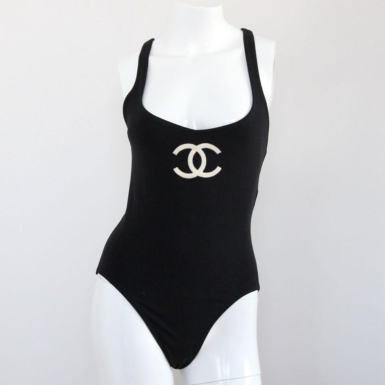 CHANEL 1994 Black International Flaggs CC Logo Swimsuit by Karl Lagerfeld  at 1stDibs | chanel bathing suit, black chanel swimsuit, chanel swimming  suit