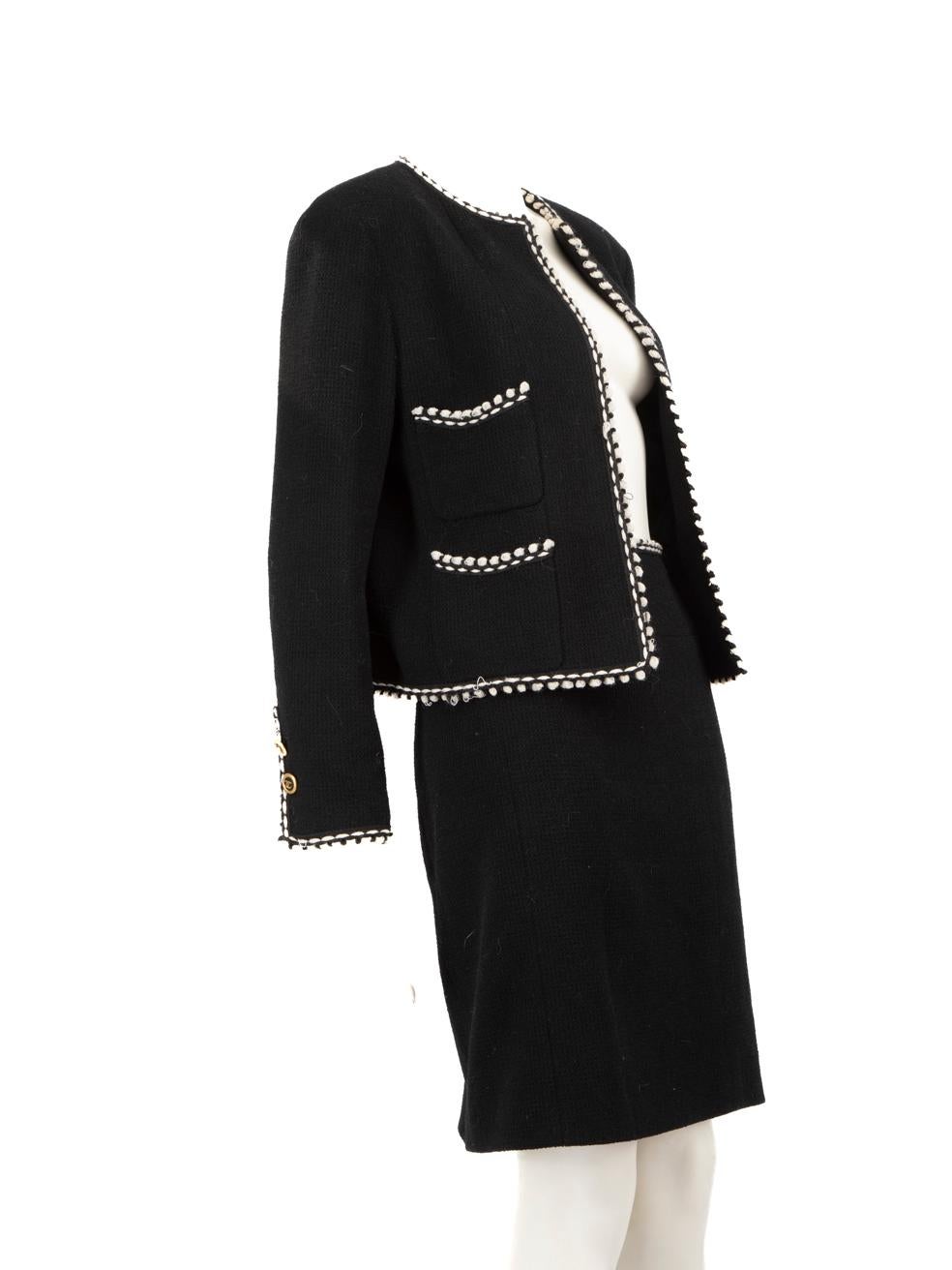 CONDITION is Very good. Minimal wear to matching set is evident. Plucks to the thread on left flap of the jacket, near the cuff on the left sleeve, on the hemline at the bottom. Plucks to the threads can also be found on the right flap, near the