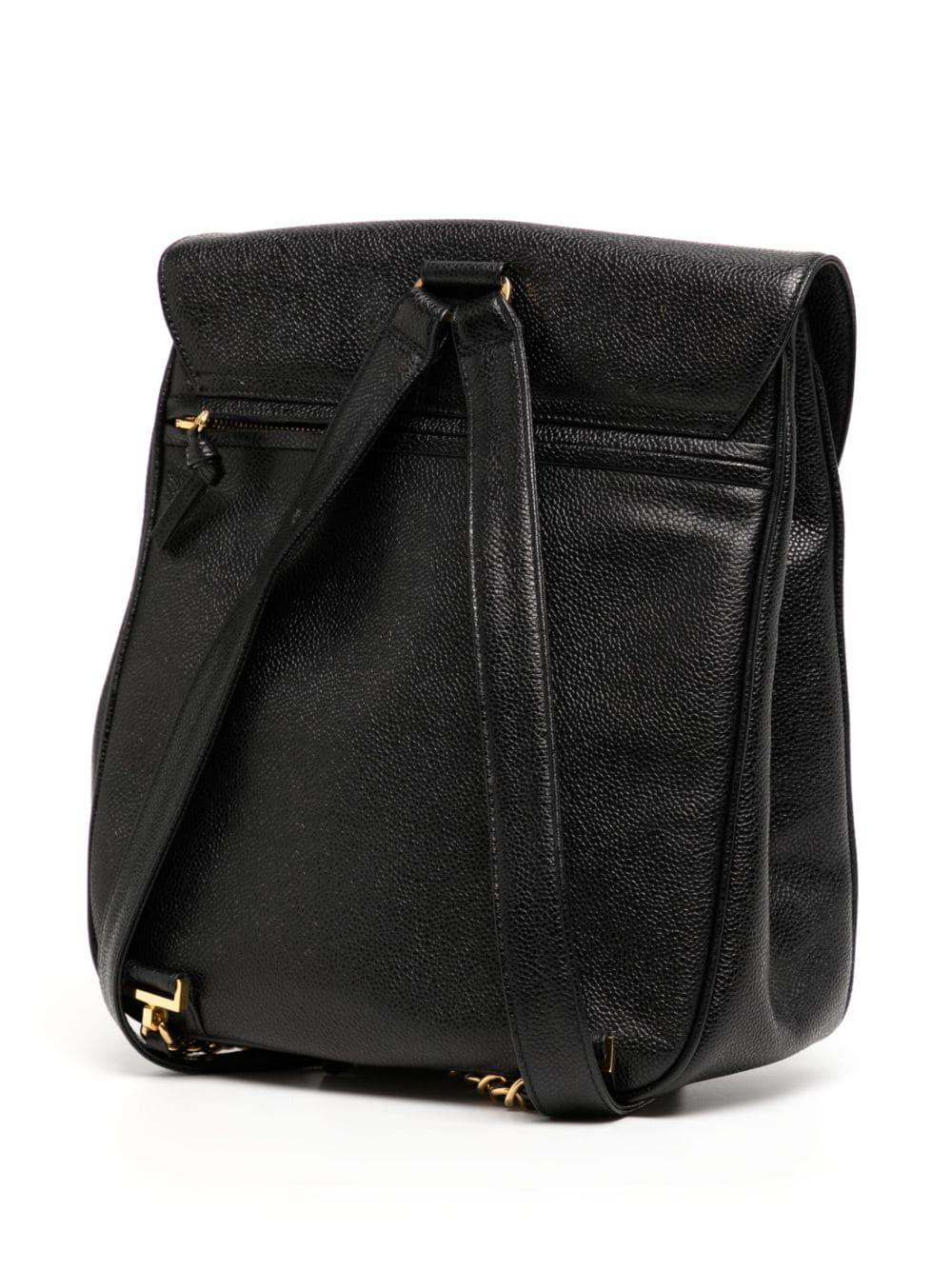 Women's or Men's Chanel 1994 Vintage Caviar Black Leather Double Pocket Duma Backpack Bag For Sale
