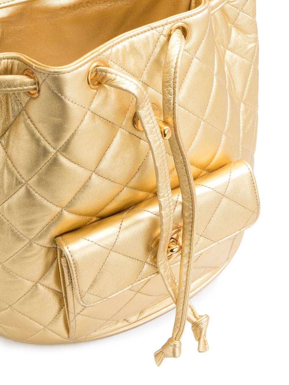Women's or Men's Chanel 1994 Vintage Rare Metallic Gold Quilted Lambskin Duma CC Logo Backpack For Sale