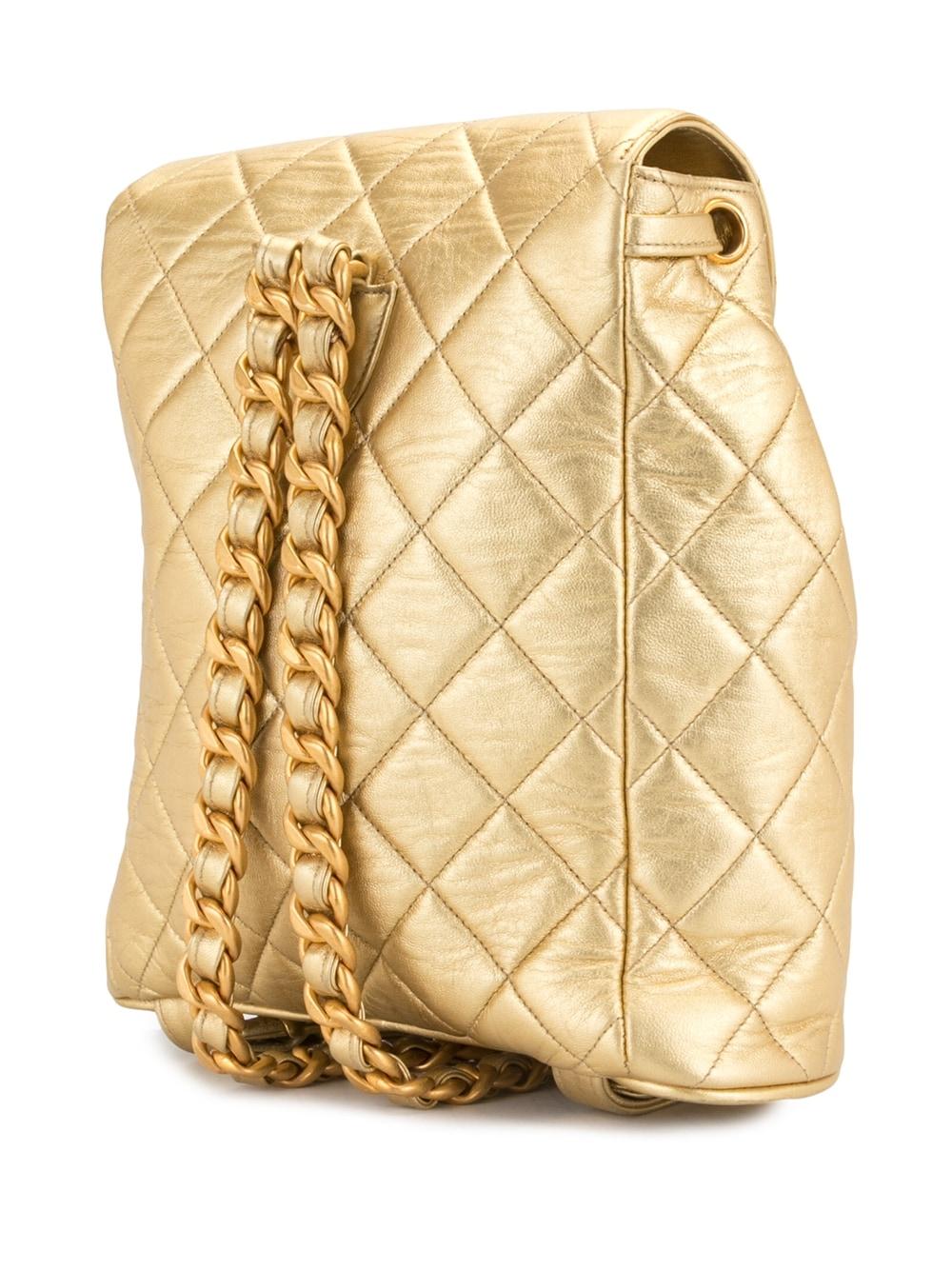Chanel 1994 Vintage Rare Metallic Gold Quilted Lambskin Duma CC Logo Backpack For Sale 2