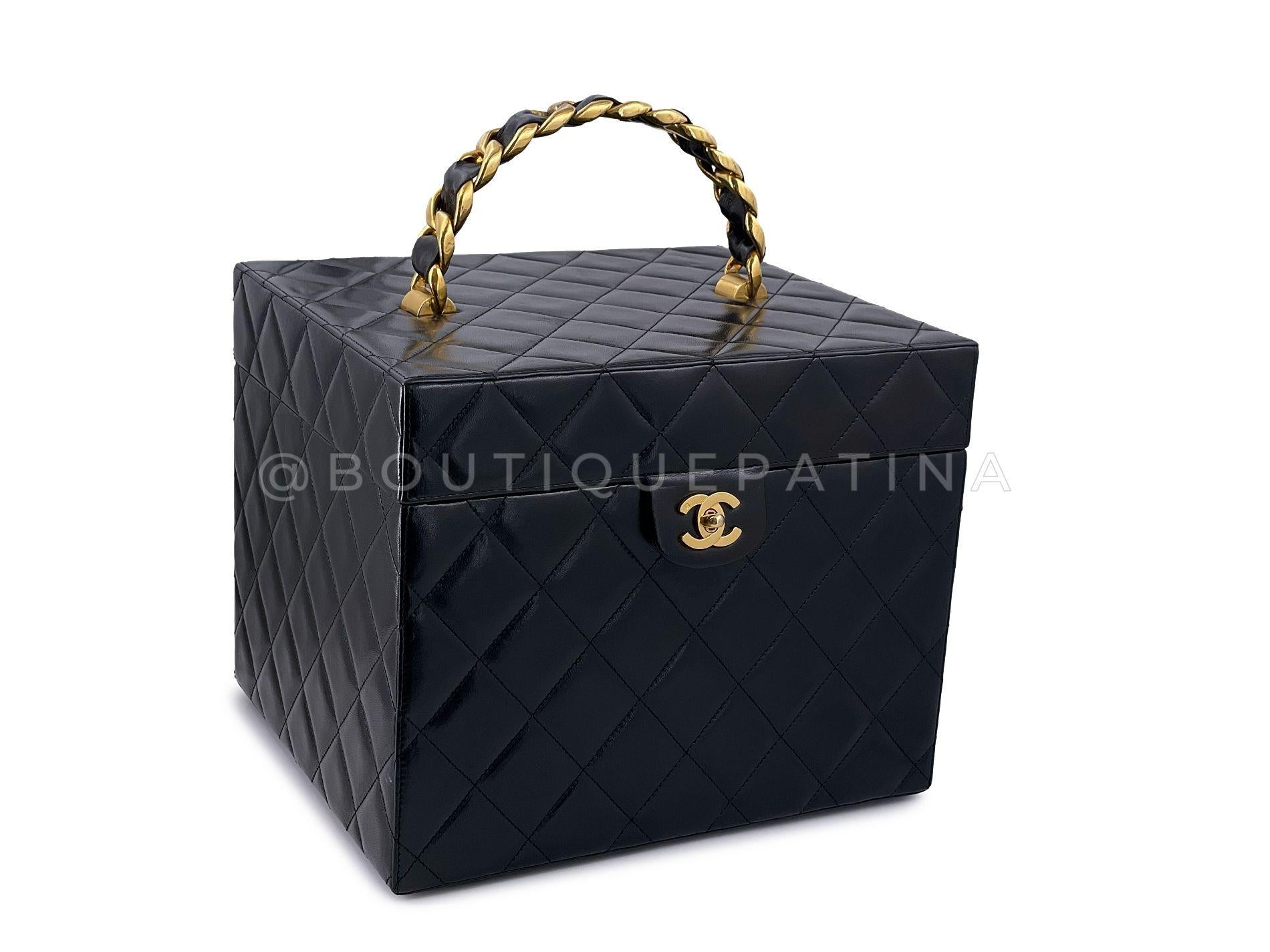 Store item: 68031
A very rare collectible item is this Chanel 1994 Vintage XL Quilted Box Vanity Case Bag 24k GHW.

There are many sizes and variations of this item released on the 1994 runway, but this beauty is the perfect cube version. A hefty