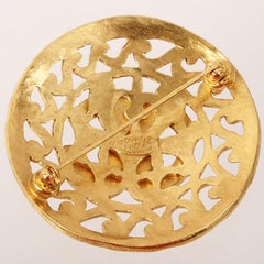 Brosche mit rundem Cc-Mark-Sonnenmotiv von Chanel, 1995