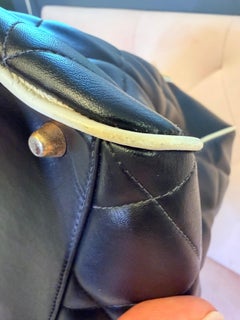 Sac de voyage « Bowler » vintage Chanel 1995, noir, avec un grand nœud et des lettres