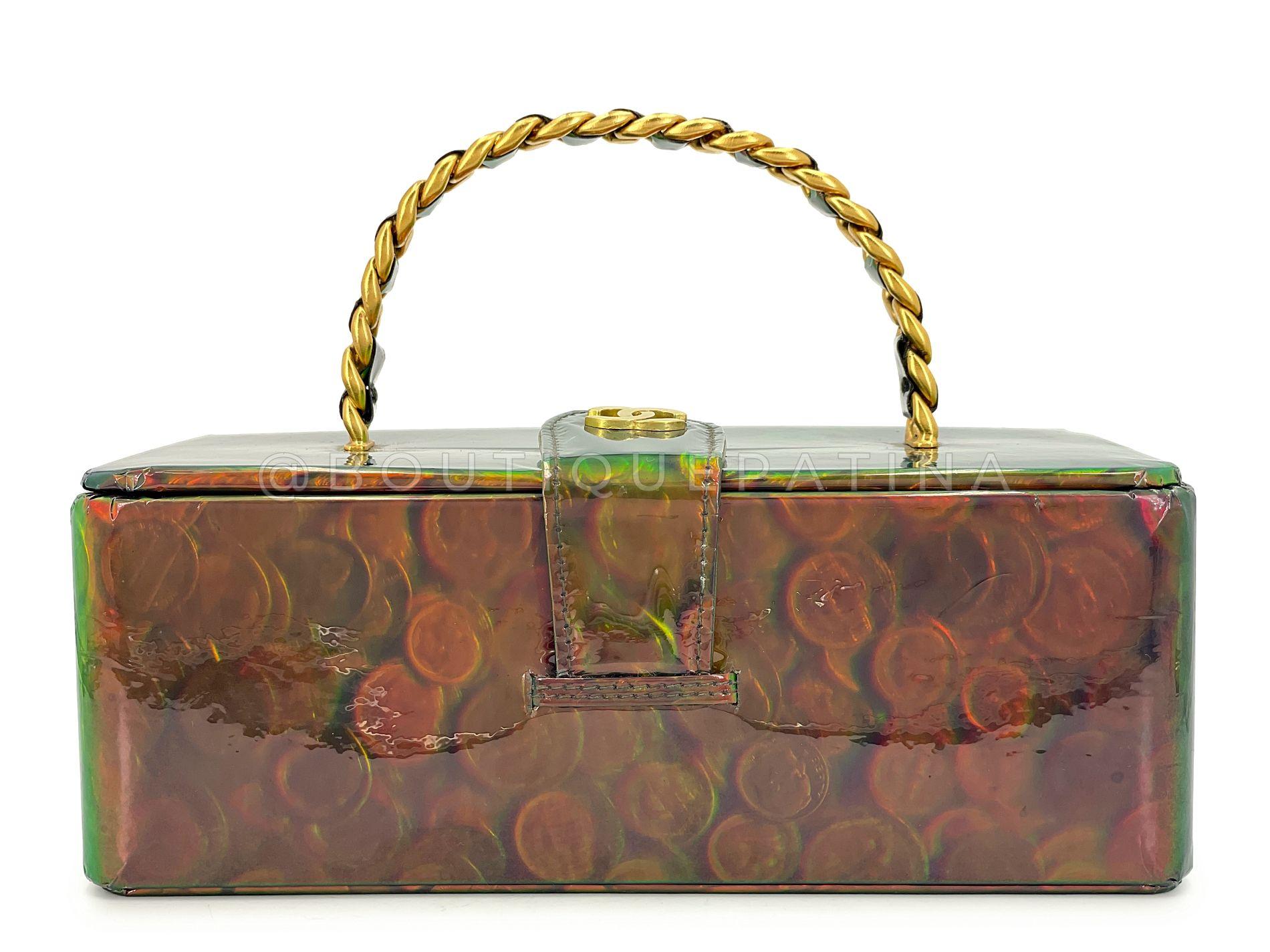 Store item: 68337
One of one! From Karl Lagerfeld's 95/96 Fall Runway show is this Chanel 1995 Vintage Holographic Green Vanity Case Bag 24k GHW. 

An 