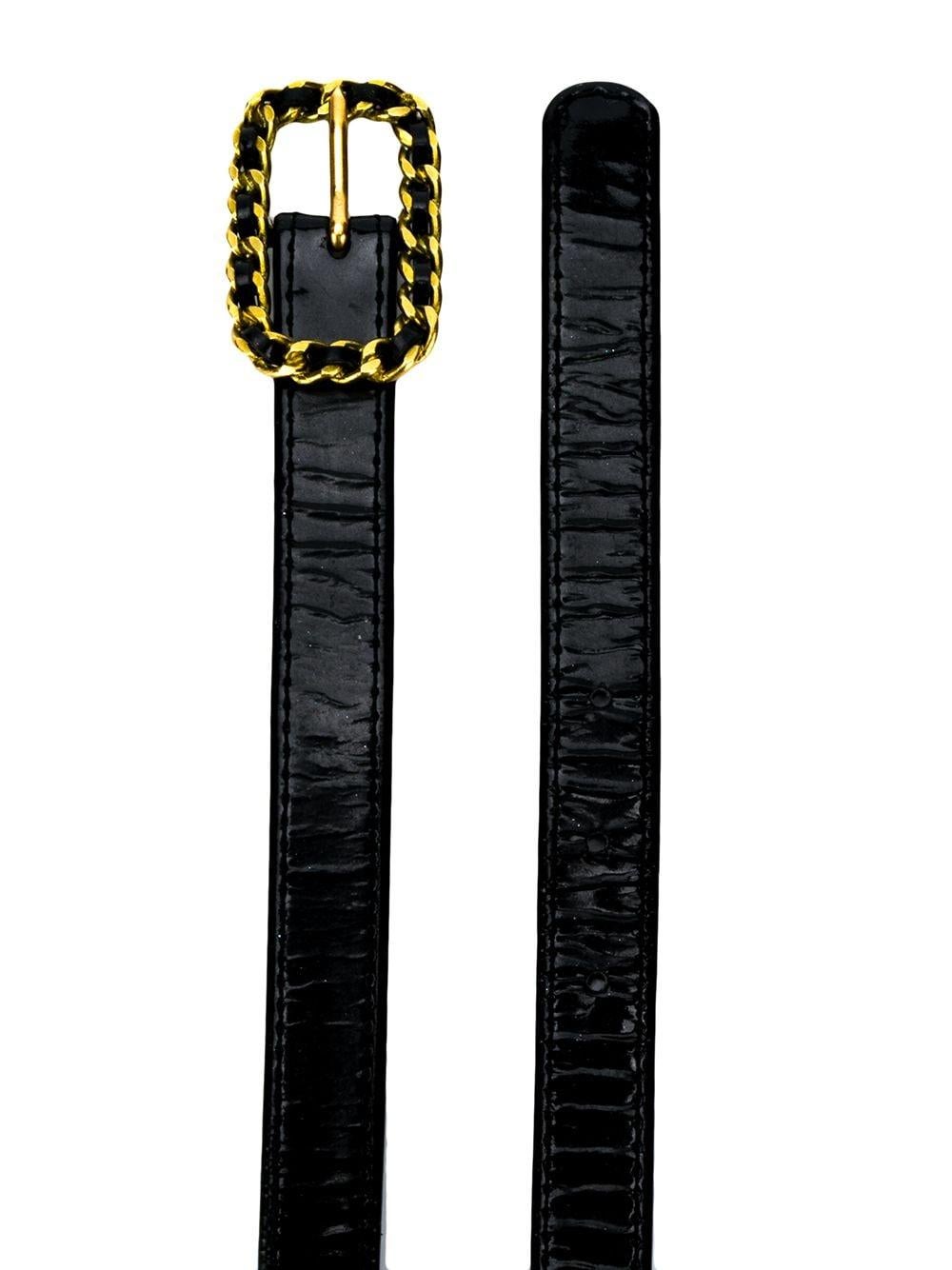 1995s Chanel black patent leather belt featuring a  gold- tone chain buckle, an inside logo stamp 95 for 1995. 
See attached Karen Mulder, Claudia Schiffer campaign.
Size:75
Circa: 1995s
Length 31.1in. (79cm)
Width 0.6in (1.5cm)
Buckle 1.5in. (4cm)