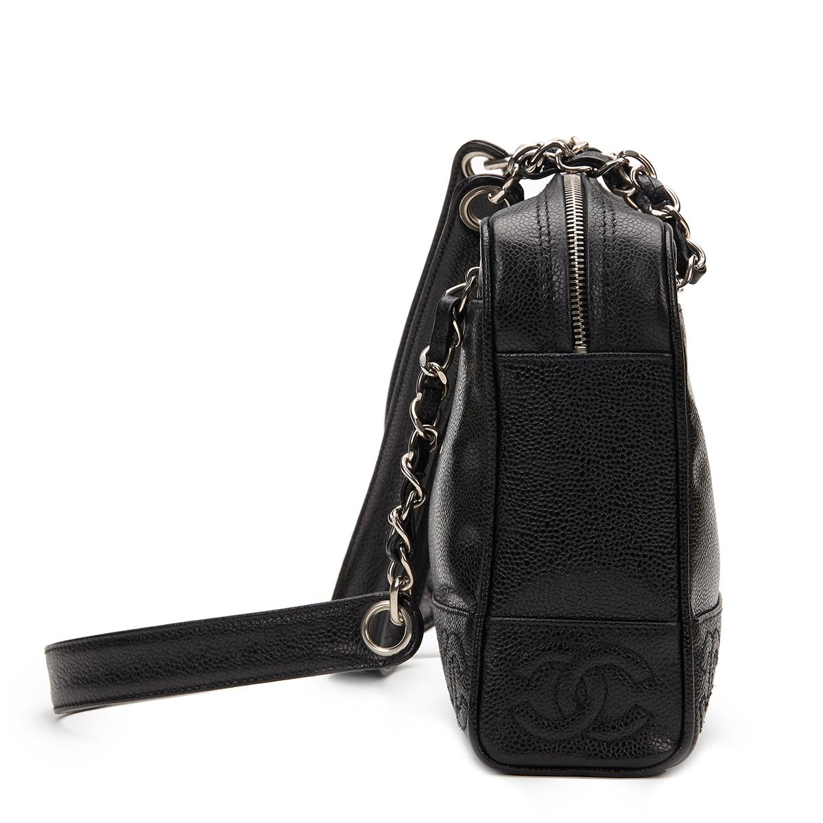 CHANEL
Black Caviar Leather Vintage Timeless Logo Trim Shoulder Bag

Reference: HB898
Serial Number: 4558290
Age (Circa): 1996
Accompanied By: Chanel Dust Bag, Box, Authenticity Card, Care Booklet
Authenticity Details: Authenticity Card, Serial